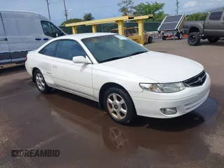 1999 Toyota Solara SE z VIN 2T1CF28P7XC201323, wystawiony jako IAAI lot #41616018 z przebiegiem 73 505 mil mil oraz . Historia ofert i sprzedaży dostępna na DreamBid. Obrazek 1.