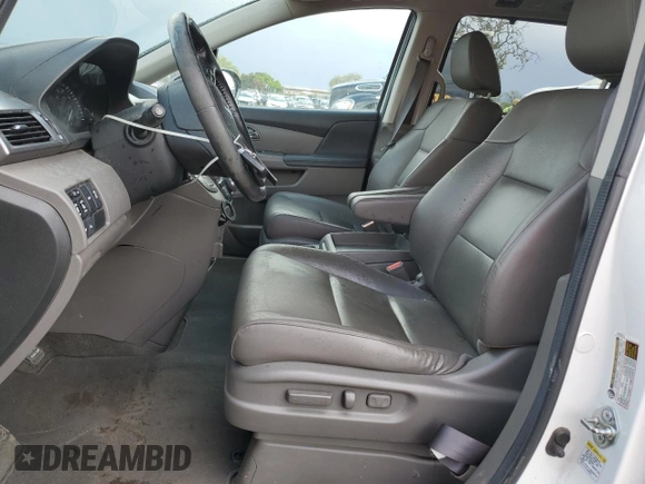 2014 Honda Odyssey Touring with VIN 5FNRL5H97EB097771, listed as a Copart auction lot 51664455 with 109,830 mi miles and Salvage Title. Bid and sale history available at DreamBid. Image 7.