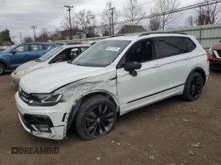 2021 Volkswagen Tiguan SE with VIN 3VV2B7AX8MM021965, listed as a Copart auction lot 53711125 with 59,554 mi miles and Salvage Title. Bid and sale history available at DreamBid. Image 1.