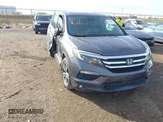 2016 Honda Pilot EX-L z VIN 5FNYF5H67GB006722, wystawiony jako IAAI lot #41023005 z przebiegiem 126 450 mil mil oraz . Historia ofert i sprzedaży dostępna na DreamBid. Obrazek 1.
