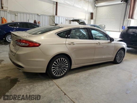 2017 Ford Fusion Hybrid Titanium with VIN 3FA6P0RU3HR360053, listed as a Copart auction lot 63063715 with 127,534 mi miles and Non repairable. Bid and sale history available at DreamBid. Image 3.