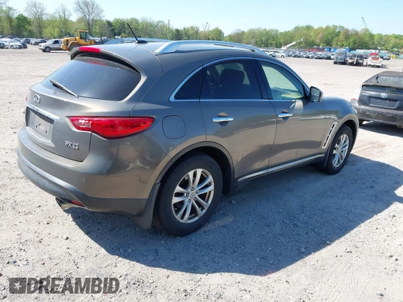 2011 Infiniti FX35 with VIN JN8AS1MW0BM141914, listed as a IAAI auction lot 42151160 with 211,708 mi miles. Bid and sale history available at carsss.com. Image 4.