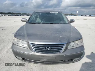 2009 Hyundai Azera Limited z VIN KMHFC46FX9A373084, wystawiony jako Copart lot #45532865 z przebiegiem 107 592 mil mil oraz Szkoda całkowita • Salvage title. Historia ofert i sprzedaży dostępna na DreamBid. Obrazek 5.