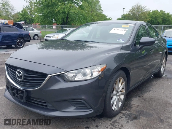 2014 Mazda 6 i Sport with VIN JM1GJ1U52E1102800, listed as a IAAI auction lot 42266283 with 103,886 mi miles and . Bid and sale history available at DreamBid. Image 2.
