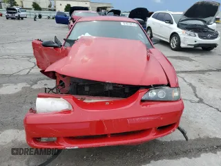 1996 Ford Mustang GT with VIN 1FALP42X4TF131093, listed as a Copart auction lot 61013915 with 158,297 mi miles and Salvage title. Bid and sale history available at DreamBid. Image 5.
