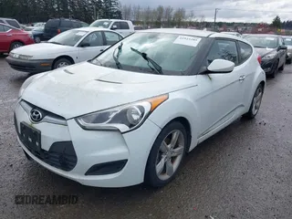 2015 Hyundai Veloster with VIN KMHTC6AD6FU236478, listed as a IAAI auction lot 41923285 with 120,079 mi miles. Bid and sale history available at carsss.com. Image 2.