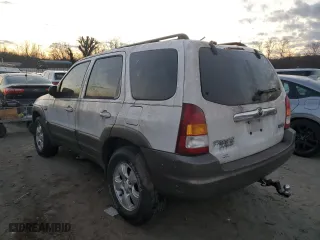 2003 Mazda Tribute LX with VIN 4F2YZ94133KM20084, listed as a Copart auction lot 82598104 with 216,848 mi miles and Salvage Title. Bid and sale history available at carsss.com. Image 2.