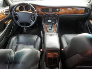 2002 Jaguar XJ with VIN SAJFA12C72LF47096, listed as a Copart auction lot 79412794 with 287,060 mi miles and Clean Title. Bid and sale history available at DreamBid. Image 8.