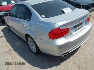 2011 BMW 3 Series 328i with VIN WBAPH7G57BNM58073, listed as a IAAI auction lot 41883231 with 144,539 mi miles. Bid and sale history available at carsss.com. Image 3.
