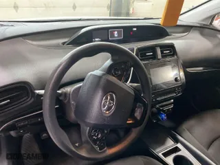 2019 Toyota Prius L Eco with VIN JTDKARFU4K3089514, listed as a IAAI auction lot 42018879 with 93,836 mi miles. Bid and sale history available at carsss.com. Image 1.