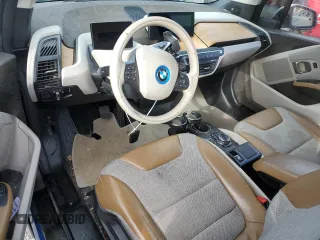 2014 BMW i3 z VIN WBY1Z2C59EV284055, wystawiony jako Copart lot #56345995 z przebiegiem Nie podano mil oraz Tytuł czysty. Historia ofert i sprzedaży dostępna na DreamBid. Obrazek 8.