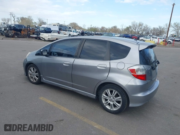 2009 Honda Fit Sport with VIN JHMGE884X9S045470, listed as a IAAI auction lot 41993638 with 181,198 mi miles. Bid and sale history available at carsss.com. Image 3.