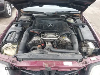 1997 Mercedes-Benz SL-Class with VIN WDBFA67F3VF142320, listed as a IAAI auction lot 41835593 with 172,151 mi miles. Bid and sale history available at carsss.com. Image 10.