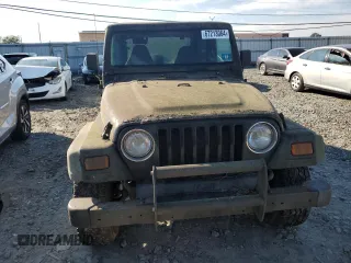 2001 Jeep Wrangler Sport with VIN 1J4FA49SX1P318889, listed as a Copart auction lot 67213064 with 157,444 mi miles and Clean Title. Bid and sale history available at carsss.com. Image 5.