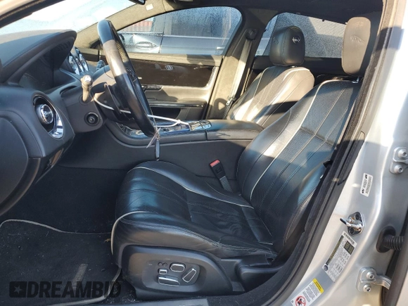 2013 Jaguar XJ Portfolio with VIN SAJWJ2GD3D8V47266, listed as a Copart auction lot 46824695 with 157,151 mi miles and Salvage title. Bid and sale history available at DreamBid. Image 7.