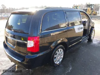2015 Chrysler Town & Country Touring with VIN 2C4RC1BG1FR609174, listed as a IAAI auction lot 41527536 with 168,818 mi miles. Bid and sale history available at carsss.com. Image 4.