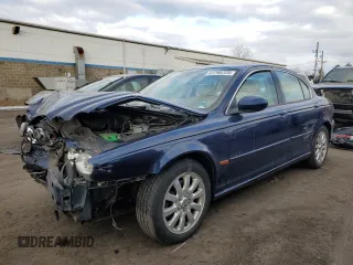 2003 Jaguar X-Type 2.5L Manual with VIN SAJEA51D33XC88212, listed as a Copart auction lot 41795725 with 250,872 mi miles and Salvage Title. Bid and sale history available at DreamBid. Image 1.