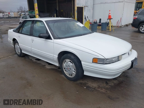 1996 Oldsmobile Cutlass Supreme S z VIN 1G3WH52M8TF346878, wystawiony jako IAAI lot #41827990 z przebiegiem 124 705 mil mil oraz . Historia ofert i sprzedaży dostępna na DreamBid. Obrazek 1.