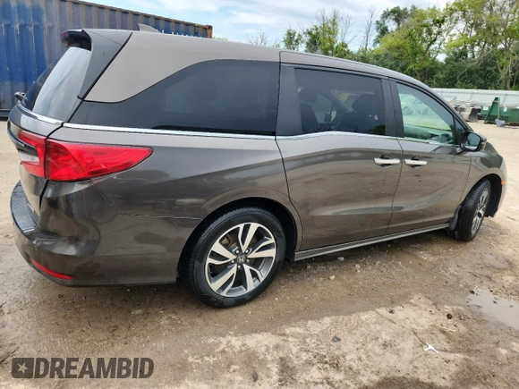 2022 Honda Odyssey Touring z VIN 5FNRL6H89NB020462, wystawiony jako Copart lot #65296455 z przebiegiem 52 058 mil mil oraz Szkoda całkowita • Salvage title. Historia ofert i sprzedaży dostępna na DreamBid. Obrazek 3.