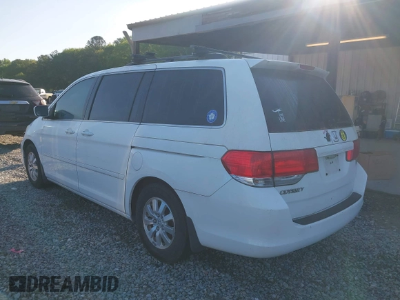 2009 Honda Odyssey EX-L with VIN 5FNRL38799B404379, listed as a IAAI auction lot 41990398 with 224,859 mi miles and . Bid and sale history available at DreamBid. Image 3.