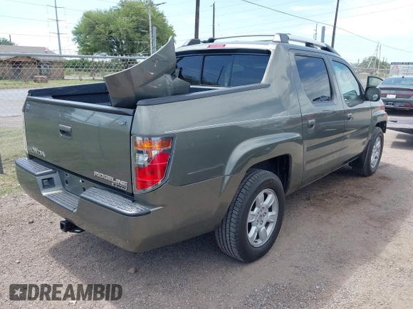 2007 Honda Ridgeline RTL with VIN 2HJYK16577H537990, listed as a IAAI auction lot 42454619 with 182,911 mi miles and . Bid and sale history available at DreamBid. Image 4.