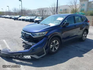 2020 Honda CR-V LX with VIN 5J6RW1H20LA013616, listed as a IAAI auction lot 41356432 with 104,164 mi miles. Bid and sale history available at carsss.com. Image 2.