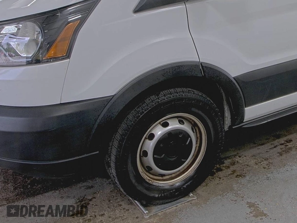 2019 Ford Transit with VIN 1FTYE1YM0KKB31938, listed as a IAAI auction lot 42667322 with 196,239 mi miles and . Bid and sale history available at DreamBid. Image 14.