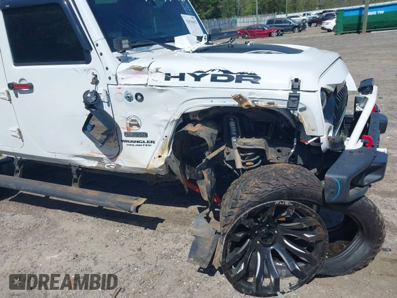 2017 Jeep Wrangler Unlimited Rubicon with VIN 1C4BJWFG9HL695361, listed as a IAAI auction lot 42010655 with 65,536 mi miles and . Bid and sale history available at DreamBid. Image 6.