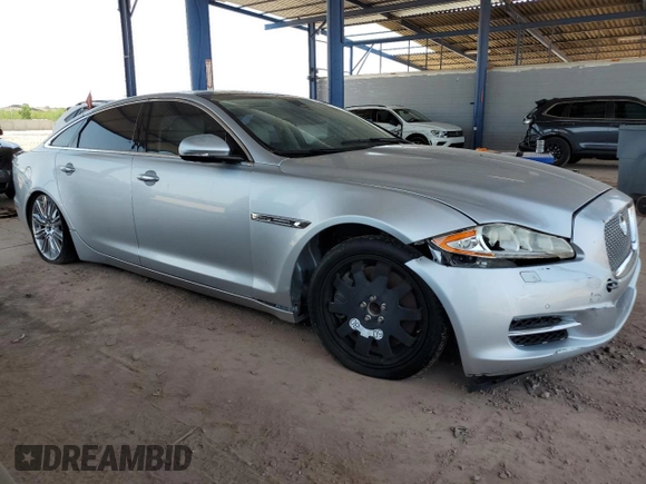 2012 Jaguar XJ Supercharged with VIN SAJWA2GE1CMV28584, listed as a Copart auction lot 63313275 with 74,023 mi miles and Clean title. Bid and sale history available at DreamBid. Image 4.