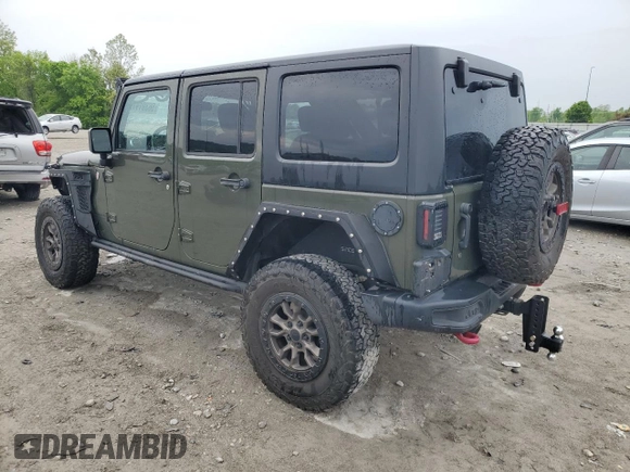 2015 Jeep Wrangler Unlimited Rubicon Hard Rock z VIN 1C4HJWFG8FL681796, wystawiony jako Copart lot #56391915 z przebiegiem 74 529 mil mil oraz Szkoda całkowita • Salvage title. Historia ofert i sprzedaży dostępna na DreamBid. Obrazek 2.