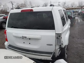 2016 Jeep Patriot Latitude with VIN 1C4NJPFAXGD749306, listed as a IAAI auction lot 41474439 with 94,767 mi miles and . Bid and sale history available at DreamBid. Image 17.