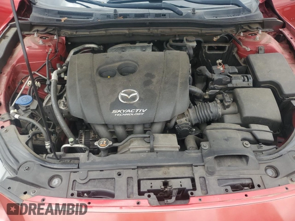 2014 Mazda 3 i Grand Touring z VIN JM1BM1M7XE1101669, wystawiony jako Copart lot #56504335 z przebiegiem 94 832 mil mil oraz Szkoda całkowita • Salvage title. Historia ofert i sprzedaży dostępna na DreamBid. Obrazek 11.