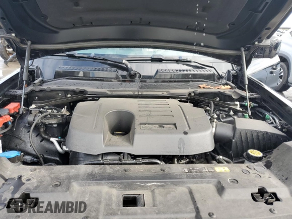 2023 Land Rover Defender SE with VIN SALEP7EU1P2186080, listed as a Copart auction lot 84107764 with 9,780 mi miles and Salvage title. Bid and sale history available at DreamBid. Image 12.