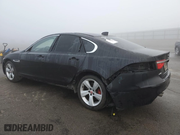 2018 Jaguar XF 25t with VIN SAJBR4FX9JCY69711, listed as a Copart auction lot 83402824 with 80,858 mi miles and Salvage Title. Bid and sale history available at carsss.com. Image 2.