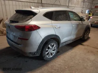 2019 Hyundai Tucson Value with VIN KM8J3CA40KU071883, listed as a IAAI auction lot 41358246 with 57,440 mi miles. Bid and sale history available at carsss.com. Image 4.