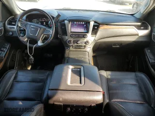 2020 GMC Yukon XL Denali with VIN 1GKS1HKJ8LR293922, listed as a Copart auction lot 76233074 with 67,273 mi miles and Salvage Title. Bid and sale history available at carsss.com. Image 8.