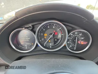 2022 Mazda MX-5 Miata Grand Touring z VIN JM1NDAM77N0503295, wystawiony jako Copart lot #58703795 z przebiegiem 14 237 mil mil oraz Szkoda całkowita • Salvage title. Historia ofert i sprzedaży dostępna na DreamBid. Obrazek 9.