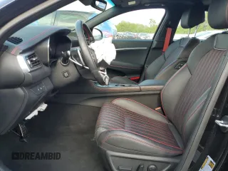 2023 Genesis G70 2.0T with VIN KMTG34TA7PU116043, listed as a Copart auction lot 59585225 with 8,021 mi miles and Salvage title. Bid and sale history available at DreamBid. Image 7.