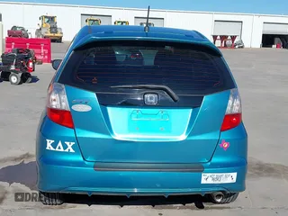 2013 Honda Fit Sport with VIN JHMGE8H56DC034820, listed as a IAAI auction lot 41737797 with 157,846 mi miles. Bid and sale history available at carsss.com. Image 17.