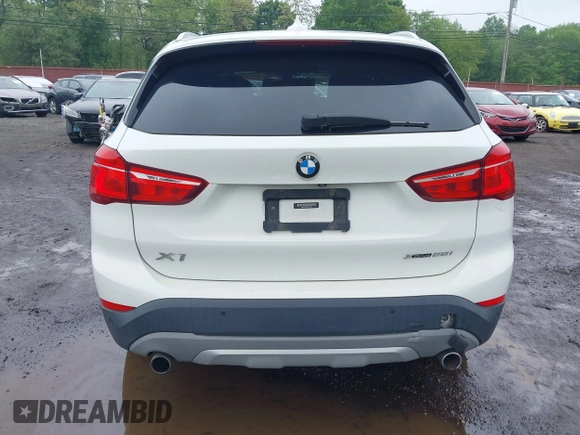 2018 BMW X1 xDrive28i with VIN WBXHT3C38J5L31322, listed as a IAAI auction lot 42260190 with 70,266 mi miles and . Bid and sale history available at DreamBid. Image 16.