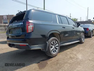 2021 Chevrolet Suburban LS z VIN 1GNSKBKD5MR303640, wystawiony jako IAAI lot #42359585 z przebiegiem Nie podano mil oraz . Historia ofert i sprzedaży dostępna na DreamBid. Obrazek 4.