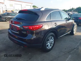 2016 Infiniti QX70 z VIN JN8CS1MW6GM750425, wystawiony jako IAAI lot #42259340 z przebiegiem 79 350 mil mil oraz . Historia ofert i sprzedaży dostępna na DreamBid. Obrazek 4.
