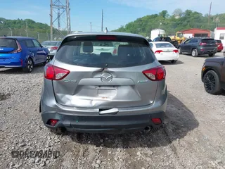2014 Mazda CX-5 Sport with VIN JM3KE2BE9E0423737, listed as a IAAI auction lot 42222646 with 116,160 mi miles and . Bid and sale history available at DreamBid. Image 16.