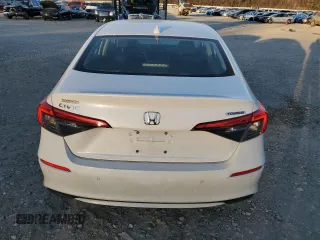 2022 Honda Civic Sedan Touring with VIN 2HGFE1F96NH301464, listed as a Copart auction lot 88975525 with 66,689 mi miles and Salvage Title. Bid and sale history available at carsss.com. Image 6.