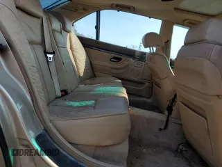 1997 BMW 7 Series 740il with VIN WBAGJ8325VDM04352, listed as a Copart auction lot 70189534 with 129,463 mi miles and Salvage Title. Bid and sale history available at carsss.com. Image 10.
