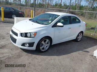 2016 Chevrolet Sonic LTZ z VIN 1G1JE5SBXG4160349, wystawiony jako IAAI lot #41725051 z przebiegiem 115 882 mil mil oraz . Historia ofert i sprzedaży dostępna na DreamBid. Obrazek 2.
