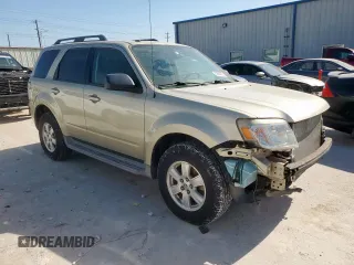 2010 Mercury Mariner with VIN 4M2CN8BG0AKJ09078, listed as a Copart auction lot 52863705 with 98,350 mi miles and Salvage title. Bid and sale history available at DreamBid. Image 4.