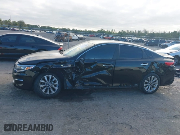 2018 Kia Optima LX with VIN 5XXGT4L38JG256924, listed as a IAAI auction lot 41267413 with 129,820 mi miles and . Bid and sale history available at DreamBid. Image 14.