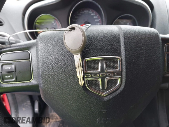 2013 Dodge Avenger with VIN 1C3CDZAB5DN621415, listed as a IAAI auction lot 41603723 with 152,733 mi miles and . Bid and sale history available at DreamBid. Image 11.