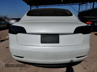 2021 Tesla Model 3 Standard Range Plus with VIN 5YJ3E1EA7MF978749, listed as a Copart auction lot 43377955 with 51,871 mi miles and Salvage Title. Bid and sale history available at carsss.com. Image 6.
